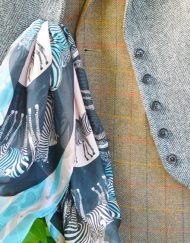 Abracazebra Teal scarf styled in buttonhole